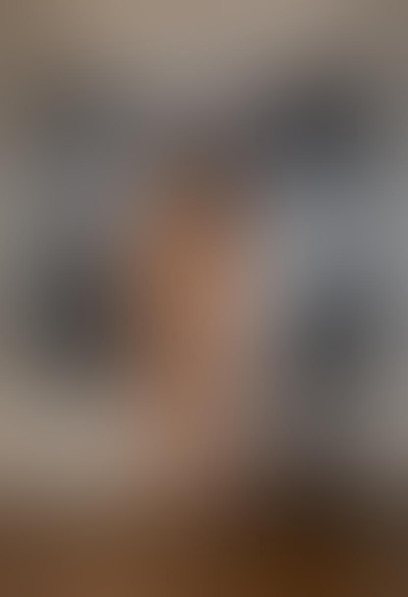 A chic art gallery setting with intimate couples admiring provocative art pieces depicting sensuality and human connection. Soft, warm lighting creates an inviting atmosphere, with adult film posters subtly integrated into the decor. Elegant sculptures and paintings evoke passion and intimacy, while visitors engage in conversation about the art's deeper meanings. The environment should reflect elegance and sophistication, blending artistic expression with adult themes. vibrant colors. super-realistic.